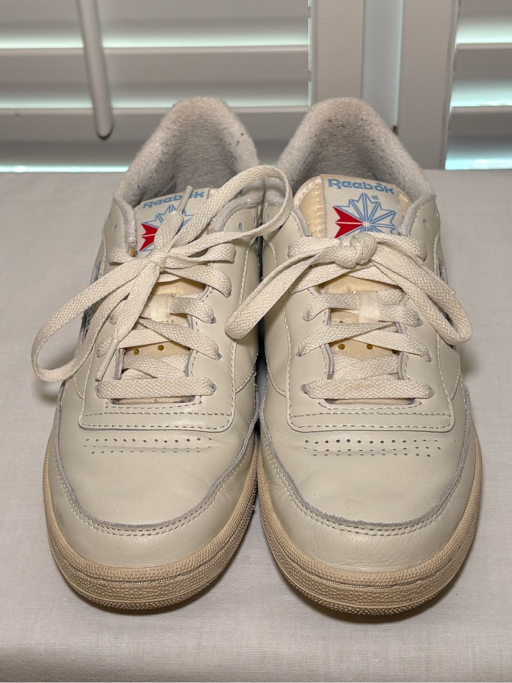 Reebok Women’s Leather Sneakers in Cream with Red Logo